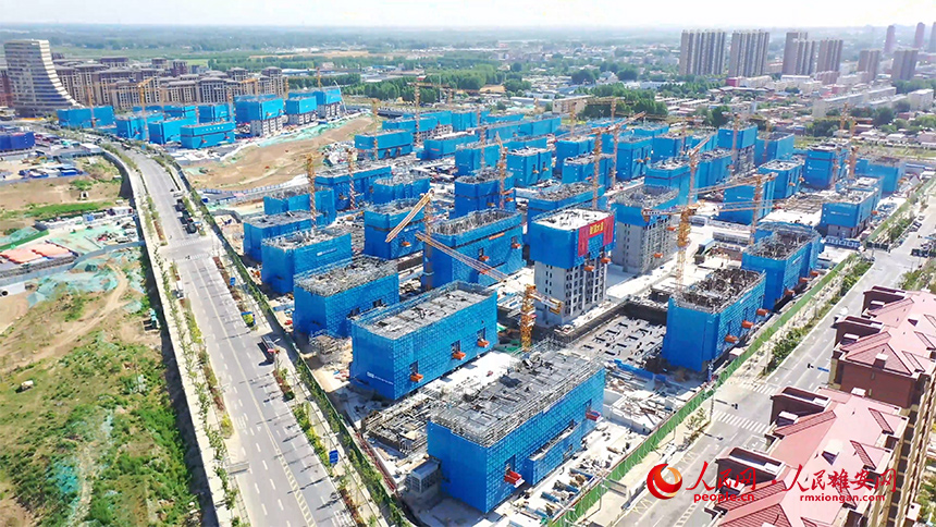 容西片區F單元安置房及配套設施項目F5標段建設現場。中冶建工供圖